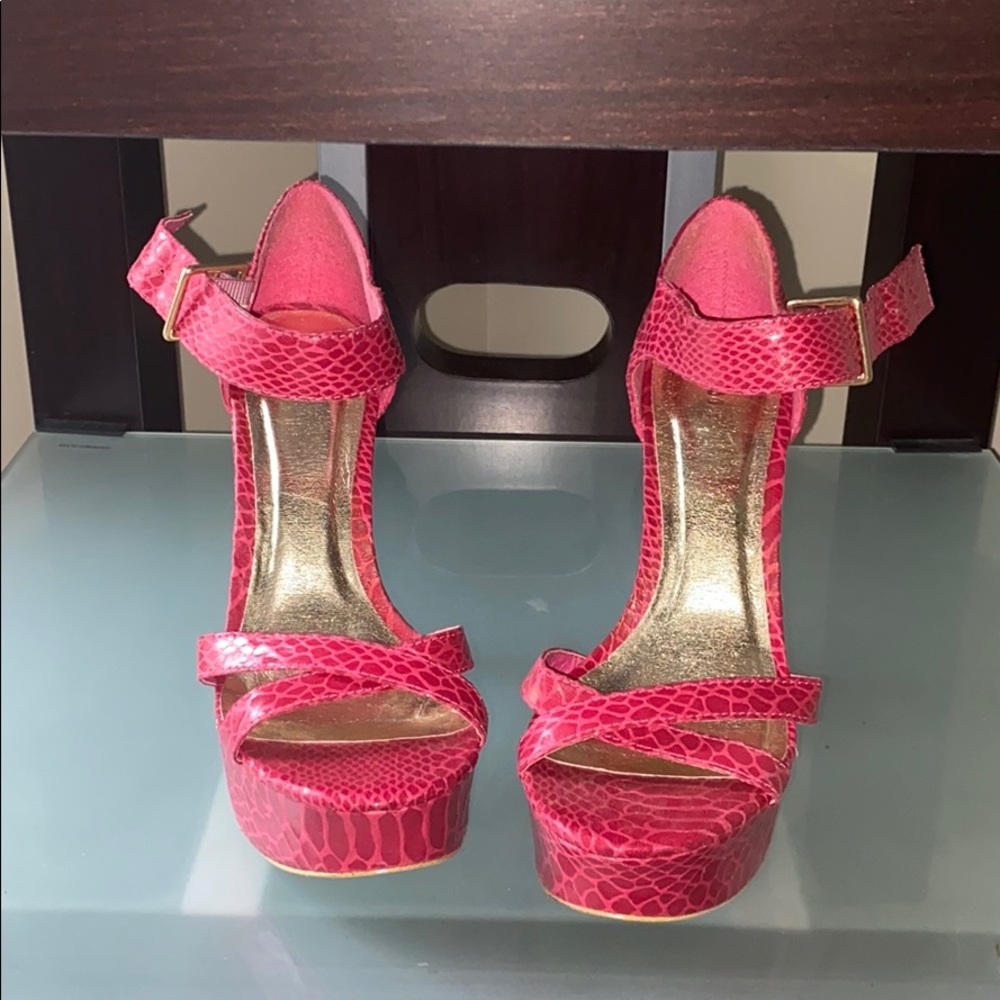 Pink snake skin like scandal heels